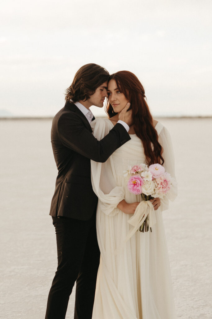 Bride and groom eloping at Bonneville Salt Flats in Utah.