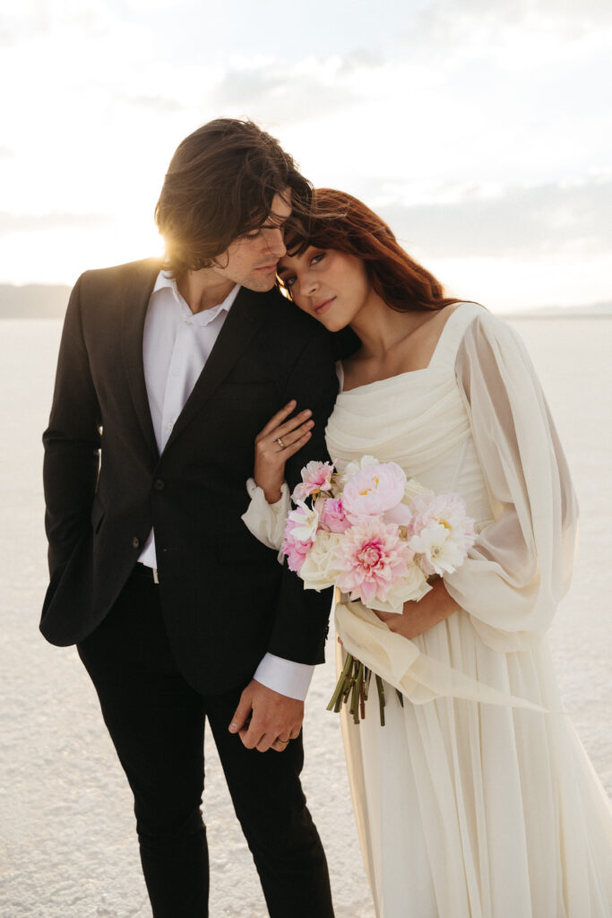 Romantic golden hour elopement photography at Bonneville Salt Flats in Utah.