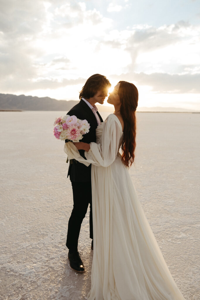 Romantic golden hour elopement photography at Bonneville Salt Flats in Utah.