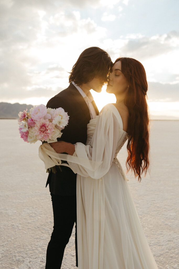 Romantic golden hour elopement photography at Bonneville Salt Flats in Utah.