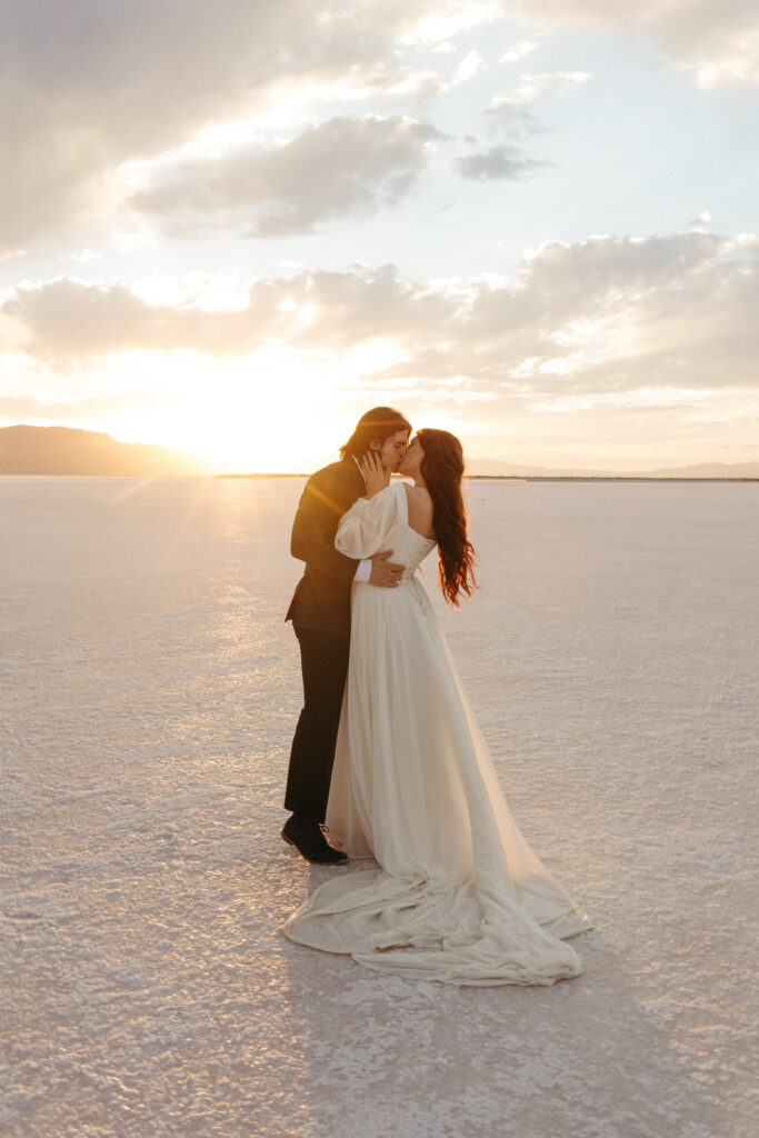 Romantic golden hour elopement photography at Bonneville Salt Flats in Utah.