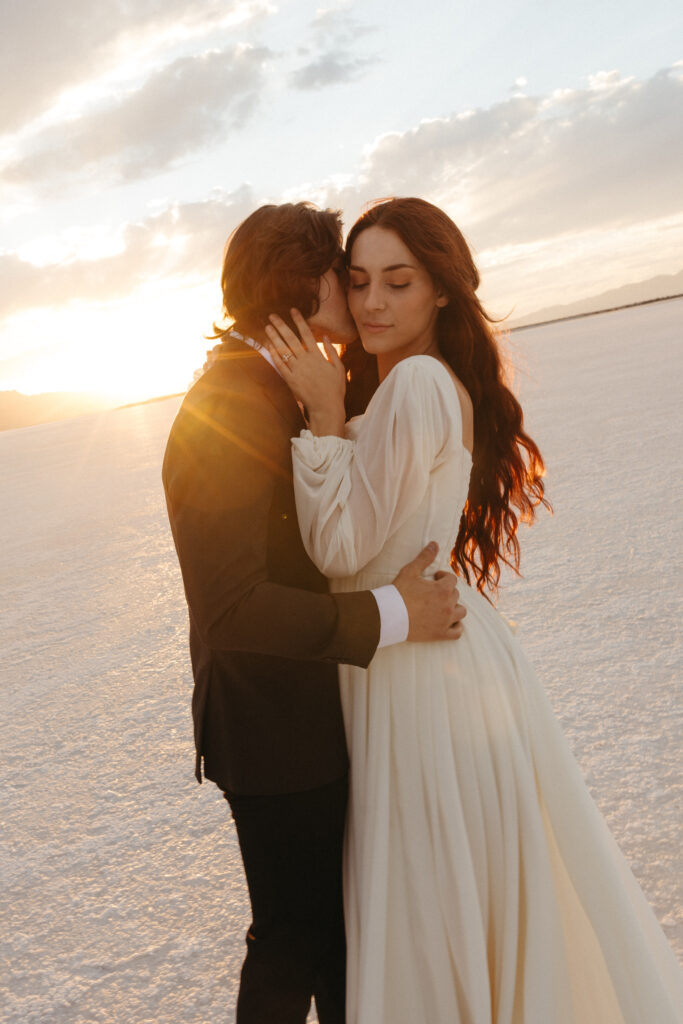 Romantic golden hour elopement photography at Bonneville Salt Flats in Utah.