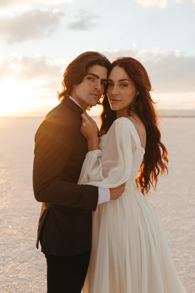 Romantic golden hour elopement photography at Bonneville Salt Flats in Utah.