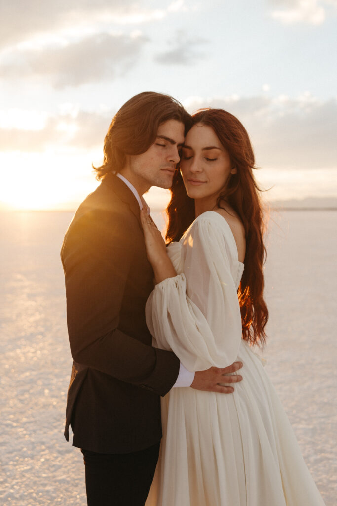 Romantic golden hour wedding photography at Bonneville Salt Flats in Utah.