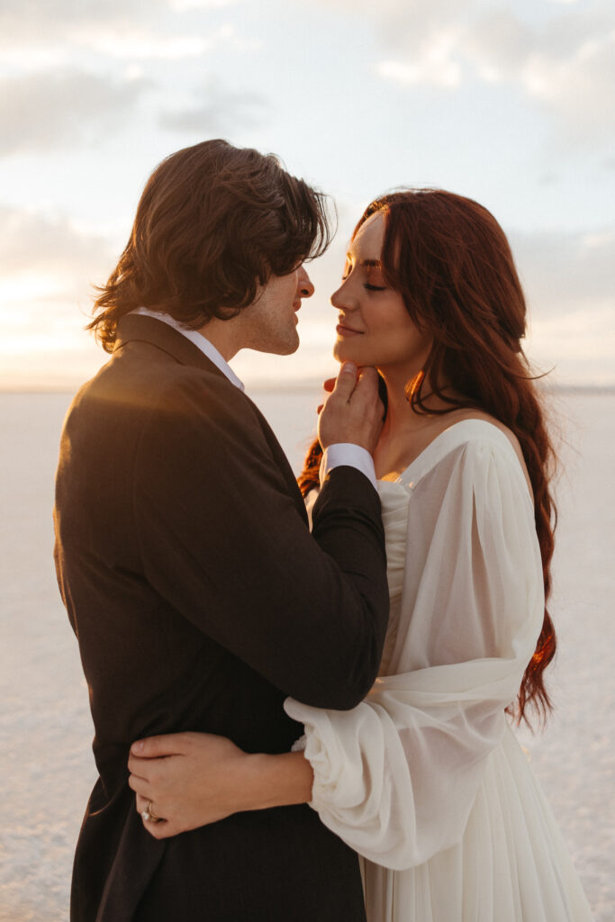 Romantic golden hour elopement photography at Bonneville Salt Flats in Utah.