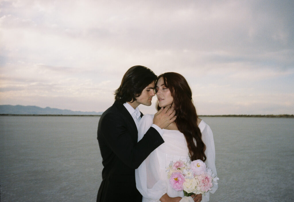 Film photography of bride and groom during elopement at Bonneville Salt Flats in Utah.