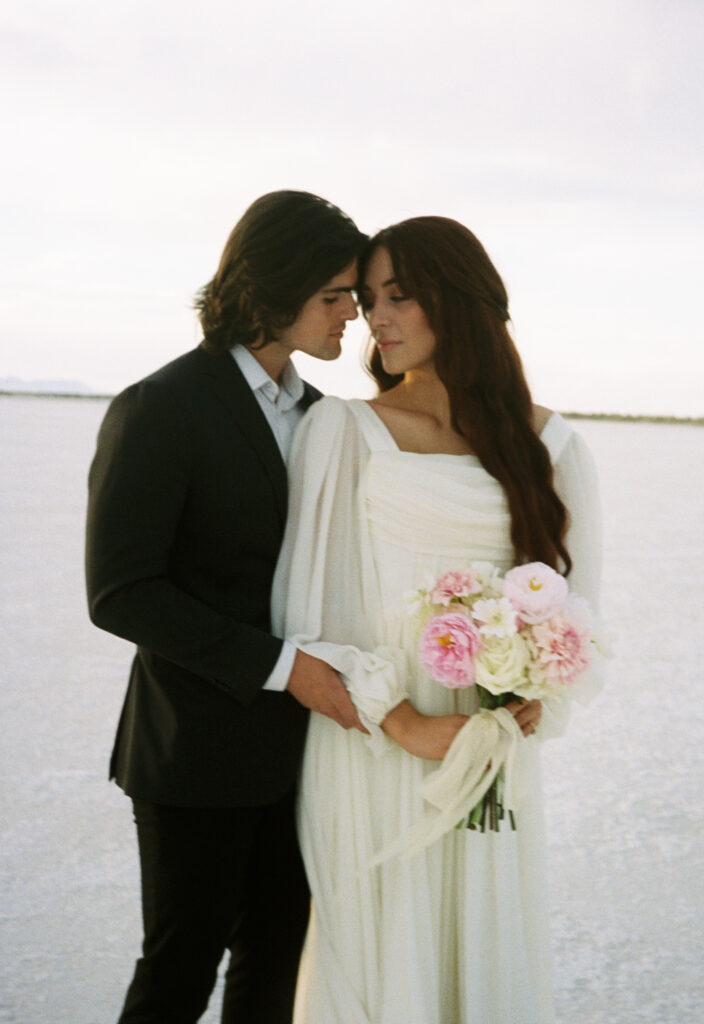 Film photography of bride and groom during elopement at Bonneville Salt Flats in Utah.